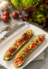 Zucchini pizza boats, low carb food.
