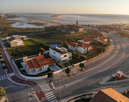 The Farol de Esposende (Esposende Lighthouse) set in front of the Fort of Sao Joao Baptista de Esposende. The two sides of Restinga de Ofir. One facing the ocean, the other the estuary of C&aacute;vado River