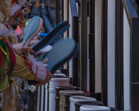person playing percussion tunos, carnival music
