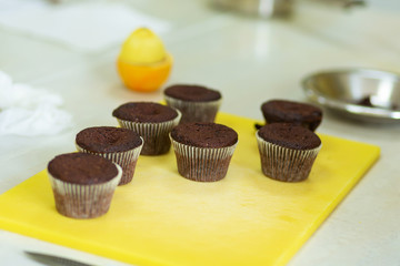 Plate with freshly baked sweet muffins. Sweet pastries, recipes, cooking