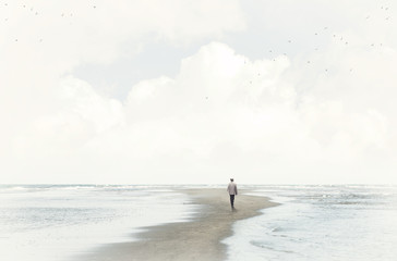 calm man walking in the sand between two seas - obrazy, fototapety, plakaty