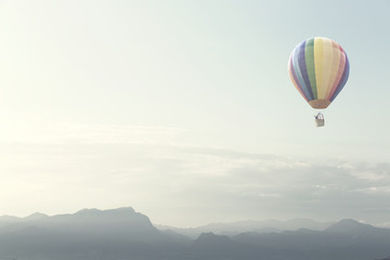 Fototapeta na wymiar big balloon flying free in the sky