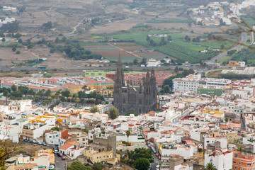 Fototapeta na wymiar Landmarks of Grand Canary - historic town Arucas with impressive black cathedral. Canary islands of Spain