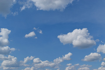 Blue sky background with clouds. Nature abstract composition