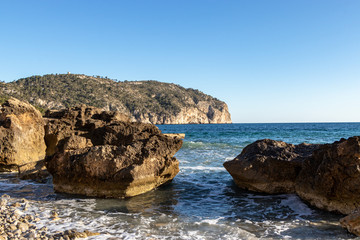 Rocks beautiful beach turquoise sea water, Camp de Mar, Majorca island, Spain