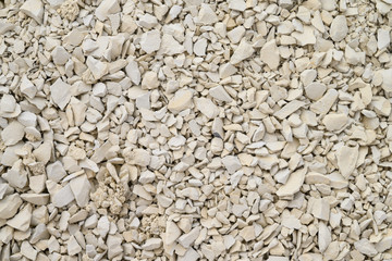 White clay powder texture. Close up. Ural food clay. Texture. Background. top view. Flat lay. No people. Selective focus