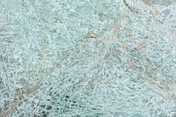 Broken car glass after an accident close up