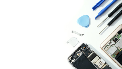 Technician repairing the Cell phone parts and tools for recovery repair smartphone and upgrade...