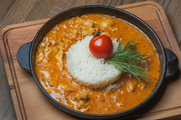meat stew in a pan and with white rice