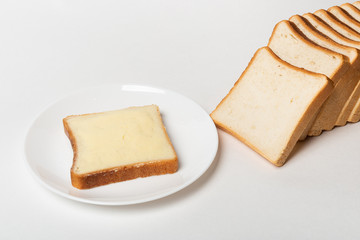 slice of wheaten bread spreaded with butter