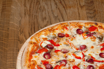 cooked pizza with cheese close-up
