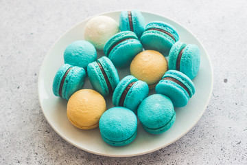Macaroons. Delicious french desserts. Macaroons on the table	