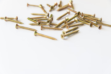 tapping screws made of steel, metal screw, iron screw, chrome screw, screws as a background, wood screw, white background