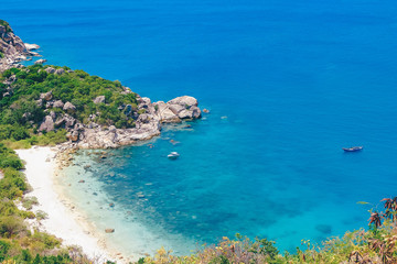 Beautiful tropical beach of Binh Ba, the paradise island with the coast, white sand, clean water, boat, and blue sky. Binh Ba island is a popular tourist destination in Cam Ranh, Nha Trang, Vietnam