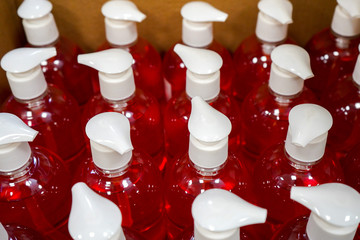 Cosmetic spray packaging at a store warehouse. Wholesale trade in lotions, cosmetics for hygiene