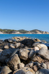 Rocks, cliffs, island and sea water during sunset from the view point cap andritxol in Camp de Mar, Majorca island, Spain