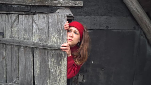 The girl was lost in the woods. A frightened girl in the woods. The face of a frightened girl. A girl in an abandoned house. Horror video. Mystical video. Fantastic video.