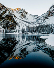 Amazing winter view of alpine Lake Braies (Lago di Braies) in South Tyrol, Italy. Lake Braies is one of the most popular and famous Italian lakes.