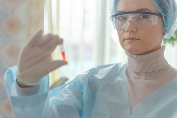 Naklejka premium The scientist doctor created a vaccine against the coronavirus SARS-CoV-2 in the laboratory.