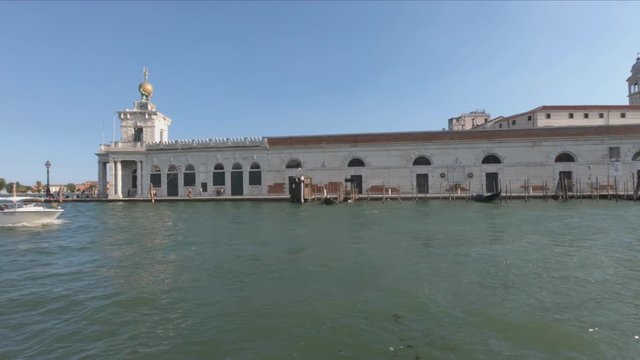 BOAT TRAVEL - Basilica Di Santa Maria della Salute, is a Roman Catholic church and minor basilica located at Punta della Dogana in the Dorsoduro sestiere of Venice, Italy.