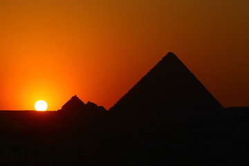 Sunset in Pyramid of Menkaure and Queens Pyramids at Giza Plateau