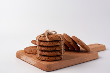 freshly baked chocolate cookies on a rustic wooden table