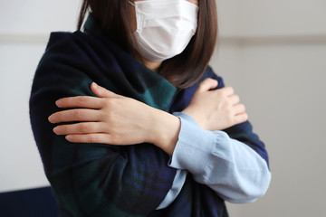 体調不良の女性