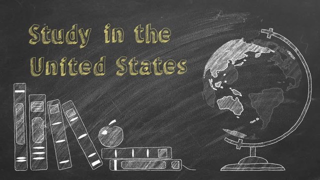Lettering "Study in the United States", rotating globe and school books are drawn with chalk on a blackboard. Study abroad concept.