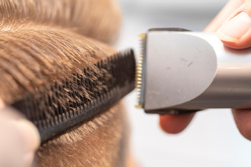 barber at work in barbershop