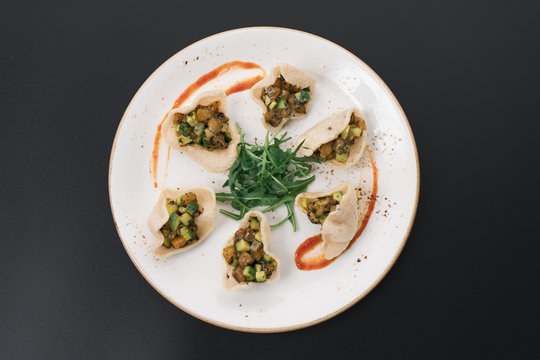 Tartlets with salad. Open sandwiches