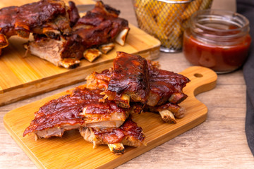 Bbq spare ribs with french fries and barbecue sauce