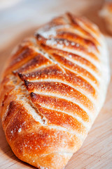 Freshly baked loaf of bread, closeup.