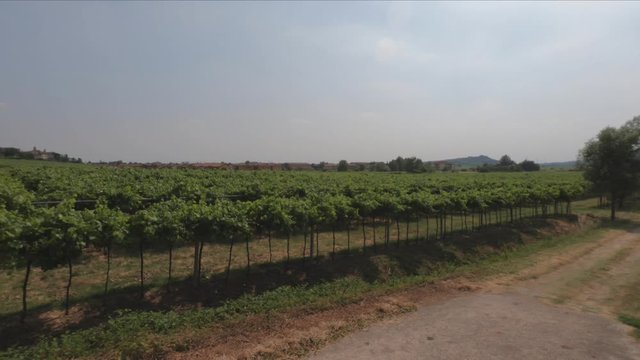 PAN SHOT SLOW MOTION - View of the Sanctuary of Santa Maria della Bassanella and Soave Castle, Italy. Soave is surrounded by vineyards that produce one of the most appreciated Italian white wines.