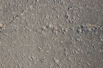 Obraz premium The texture of the broken road. Old building blocks. Background for screensaver monitor