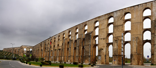 Western partial and close view of Amoreira aqueduct at Elvas