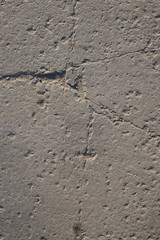 The texture of the broken road. Old building blocks. Background for screensaver monitor