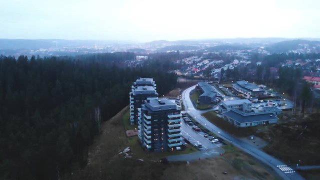 Apartment blocks in Sweden during a dark and cloudy day.
