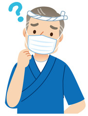 マスクをした男性　飲食店　店主