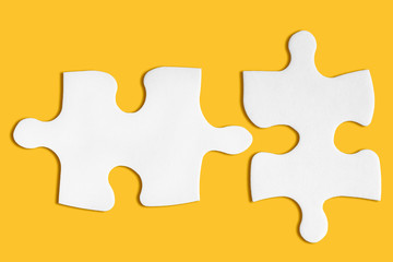Business concept. Two matching puzzle pieces. Metaphor of partnership, teamwork, problem solution,...