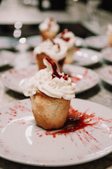 Several plates with desserts. Cream and jam desserts