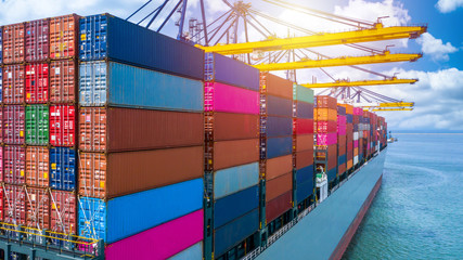 Container ship unloading in deep sea port, Global business logistic import export freight shipping...