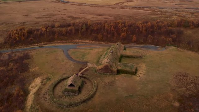 Aerial 4k view of traditional Icelandic Turf Houses in autumn with a beautiful landscape, Iceland, 