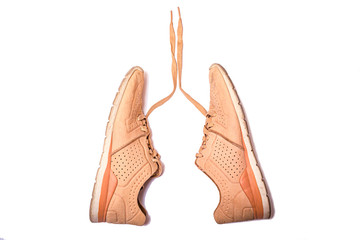 Sport stylish sneakers in form like a lungs. Run for lungs. Health care coneptual image.