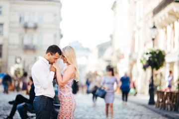 Smiling couple in love outdoors, lviv. summer