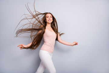 Profile photo of attractive model lady demonstrate neat long healthy hairstyle flying on air after...