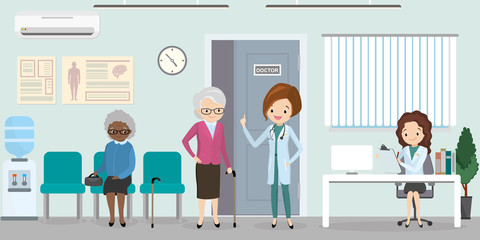 hospital reception desk in clinic and woman doctor in uniform standing with old women patients