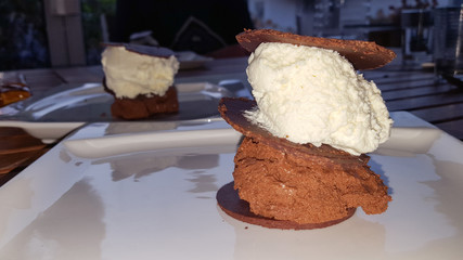 white chocolate cream ice cream ball cake with bar