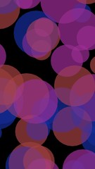 Multicolored translucent circles on a dark background. 3D illustration