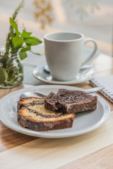 white cup with pudding notepad and pen in bar
