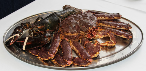 fresh crab and lobster on a plate